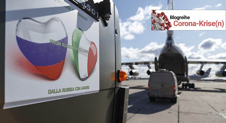 In this Sunday, March 22, 2020, photo supplied by Russian Defense Ministry Press Service, military trucks load onto an Il-76 cargo plane in Chkalovsky military airport outside Moscow, Russia. Nine hulking Il-76 cargo planes are being loaded at the Chkalovsky military airport in Moscow as Russia prepares to send medical personnel and supplies to Italy to help the country's efforts against the coronavirus. The mission include eight mobile medical teams along with medical equipment and aerosol disinfection trucks is to begin Sunday, one day after Russian President Vladimir Putin offered the aid in a telephone conversation with Italian Prime Minister Giuseppe Conte, whose country has confirmed more than 53,000 coronavirus cases and over 4,800 deaths. (Alexei Yereshko, Russian Defense Ministry Press Service via AP) |