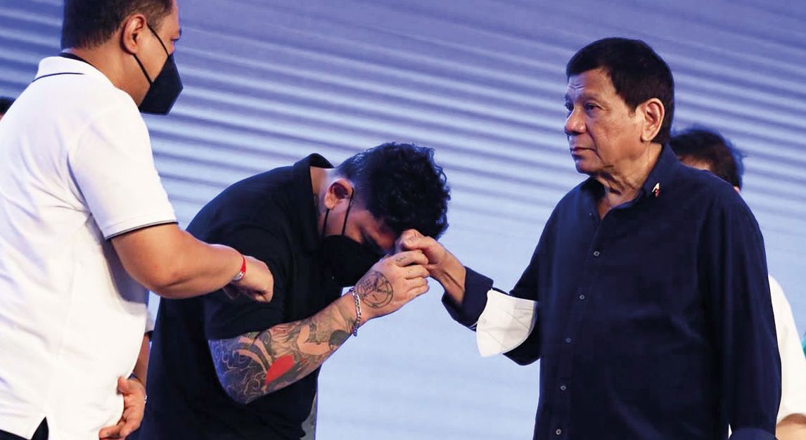 President Rodrigo Duterte with his son, mayoral aspi- rant Sebastian “Baste” Duterte in Davao City on May 6, 2022.