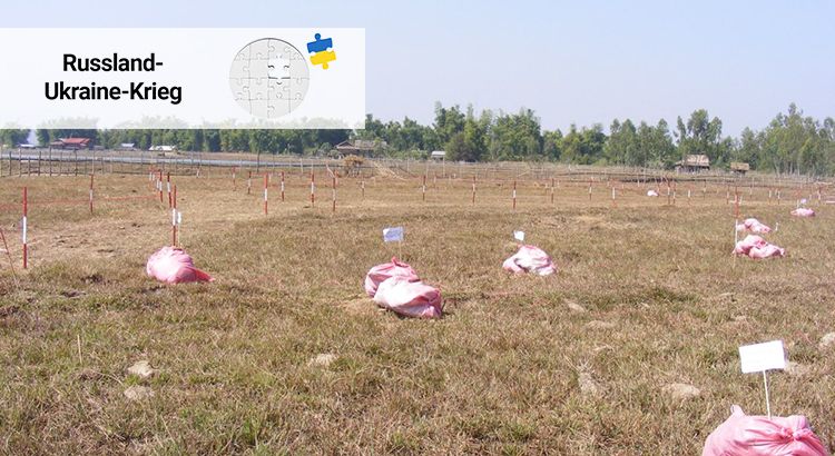Feld mit Markierungen, die Streumunition anzeigen