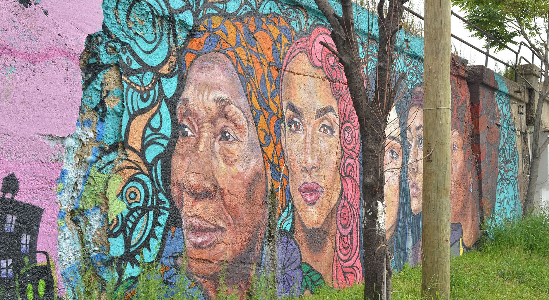 Painted wall showing various female figures