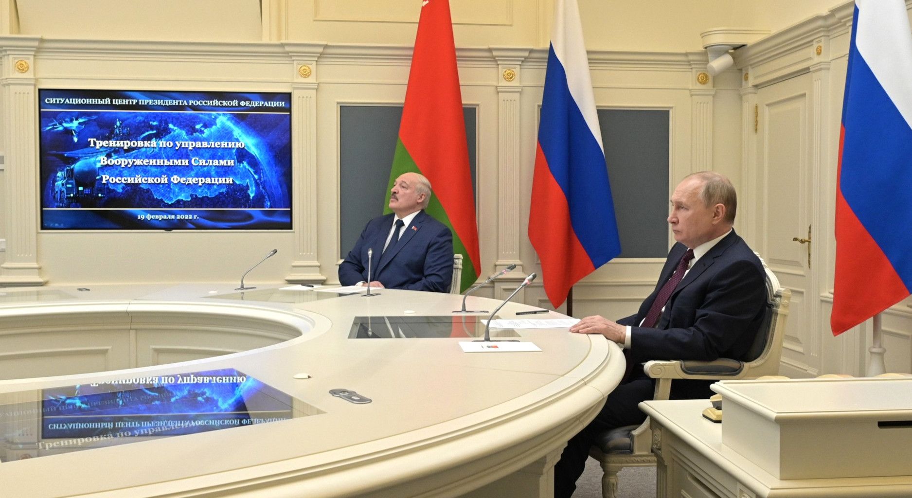 The picture shows Putin and Lukashenko in the Kremlin monitoring military exercises.