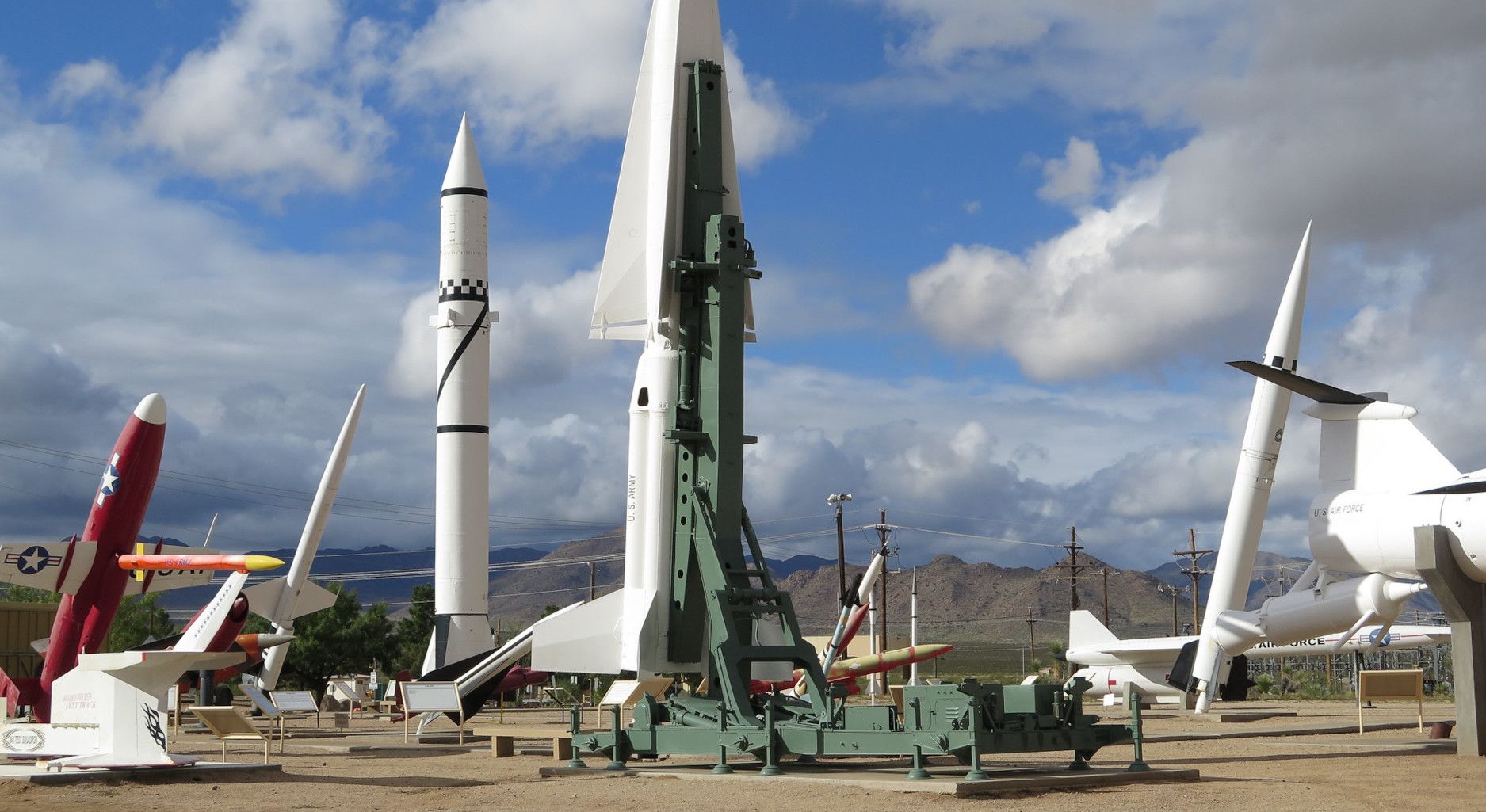 Exponation of different missiles at the territory of the White Sands Missile Museum with a MIM-14 Nike Hercules nuclear missile in the center.