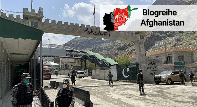 Security forces stand at the border of Pakistan and Afghanistan
