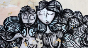 Mural of woman and man in black and white with wavy shapes.