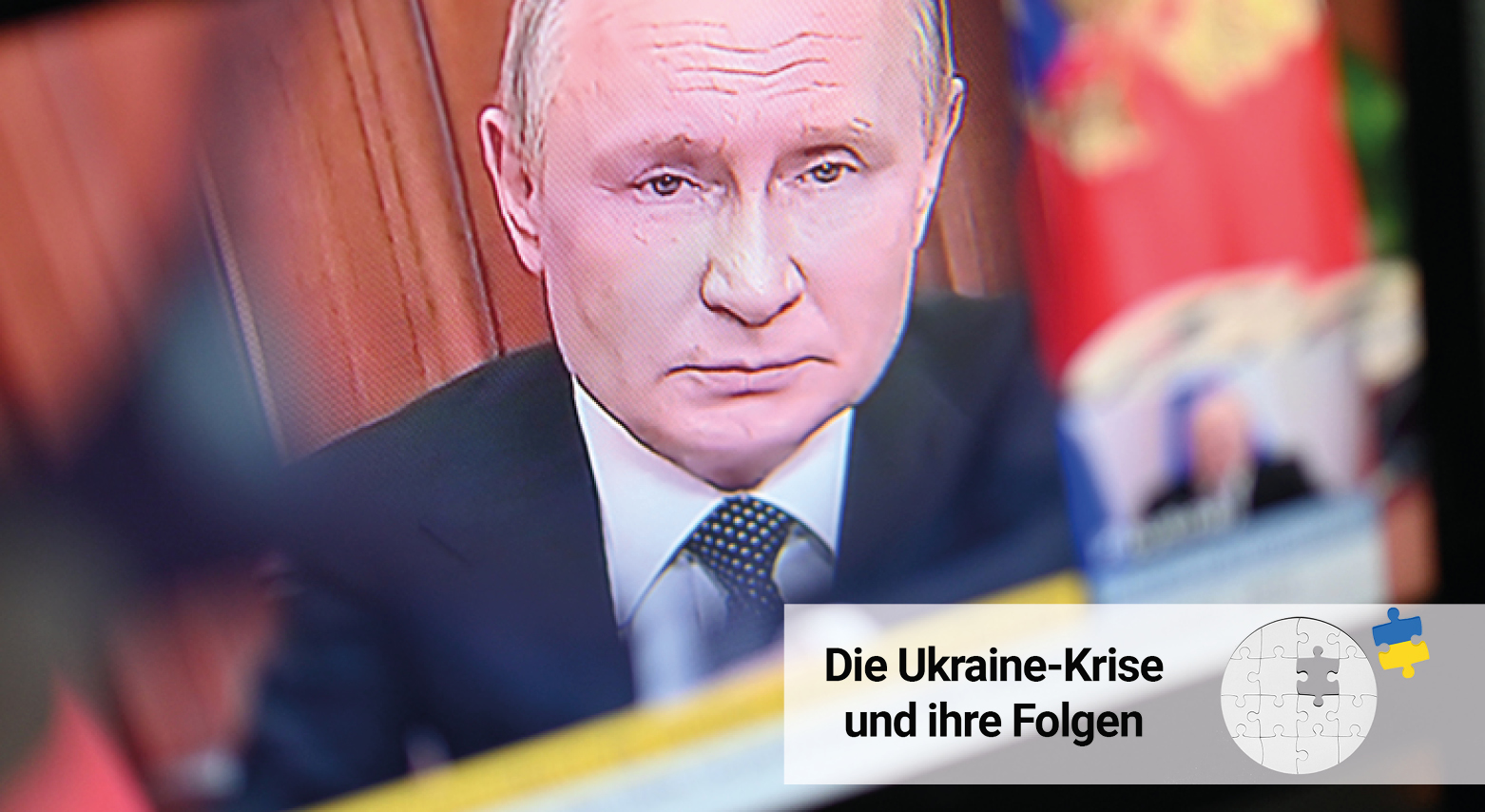 Vladimir Putin's Face on a TV-Screen