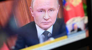 Vladimir Putin's Face on a TV-Screen
