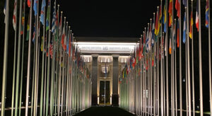 Night-time view of the Palais de Nations in Geneva