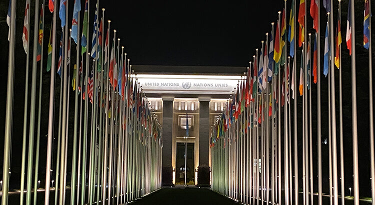 Night-time view of the Palais de Nations in Geneva