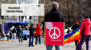 Einzelne Demonstrant:innen auf Ostermarsch in Bonn 2021