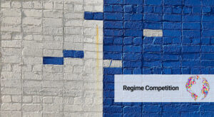 Wall with bricks, half is painted white, the other half is painted blue, but on both sides a few bricks have the opposite color.