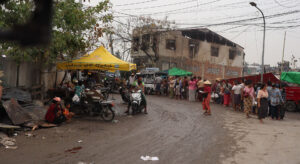 Relief workers distribute food and water to earthquake survivors in Myanmar