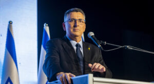 Gideon Sa'ar holding a speech.